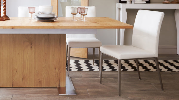 White Chairs and White Dining Table